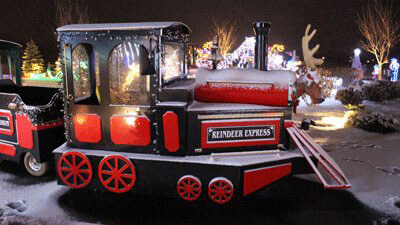 The Reindeer Express - a red and black train dusted in snow